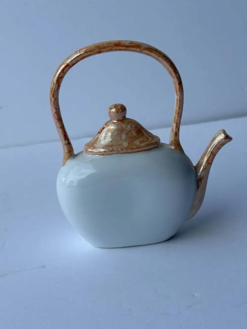 Ceramic Teapot Shaped Quartz Decorative Clock with Paw Print Accents
